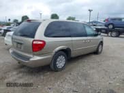 ✅ 2003 Chrysler Town & Country • VIN: 2C4GP24R63R271993 • Lot: 42825837. Listed on IAAI with 154,671 mi. Free auction sales archive from the USA and detailed vehicle history report at DreamBid. Image 4.