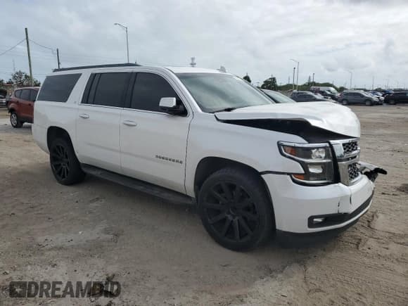 ✅ 2017 Chevrolet Suburban LT • VIN: 1GNSCHKC1HR283142 • Lot: 79503114. Wystawiony na Copart z przebiegiem 90 431 mil. Bezpłatny archiwum sprzedaży aukcyjnych z USA i szczegółowy raport historii pojazdu na DreamBid. Zdjęcie 4.