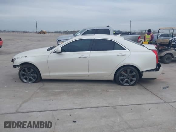 ✅ 2013 Cadillac ATS • VIN: 1G6AG5RX3D0138802 • Lot: 41192671. Listed on IAAI with 77,130 mi. Free auction sales archive from the USA and detailed vehicle history report at DreamBid. Image 14.