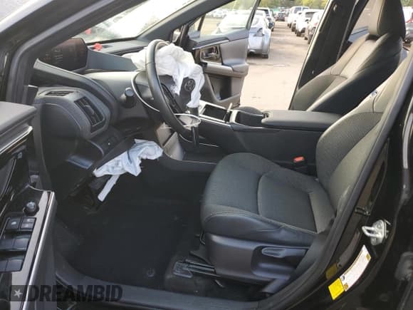 ✅ 2023 Toyota bZ4X XLE • VIN: JTMABACA8PA026438 • Lot: 81420935. Wystawiony na Copart z przebiegiem 16 806 mil. Bezpłatny archiwum sprzedaży aukcyjnych z USA i szczegółowy raport historii pojazdu na DreamBid. Zdjęcie 7.