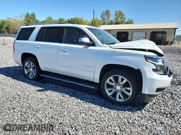2020 Chevrolet Tahoe Premier z VIN 1GNSKCKJ1LR182423, wystawiony jako Copart lot #81146275 z przebiegiem 188 840 mil mil oraz Szkoda całkowita • Salvage title. Historia ofert i sprzedaży dostępna na DreamBid. Obrazek 4.