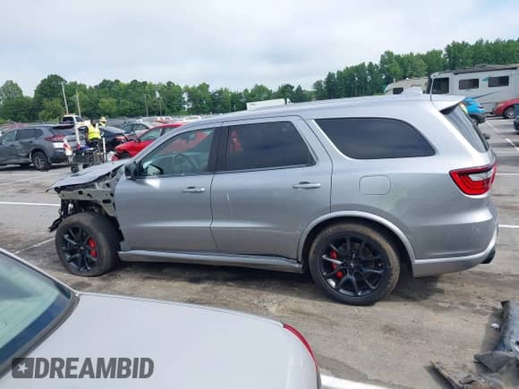 2021 Dodge Durango R/T with VIN 1C4SDJCT6MC879260, listed as a IAAI auction lot 42709837 with 59,646 mi miles and . Bid and sale history available at DreamBid. Image 15.