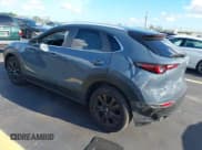 ✅ 2023 Mazda CX-30 S Carbon Edition • VIN: 3MVDMBCM6PM541737 • Lot: 42524854. Listed on IAAI with 55,093 mi. Free auction sales archive from the USA and detailed vehicle history report at DreamBid. Image 3.