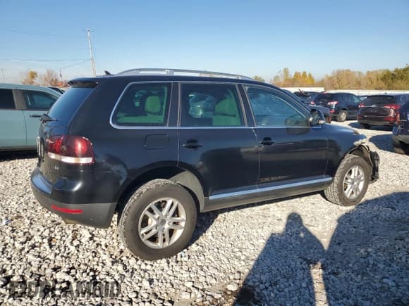 ✅ 2010 Volkswagen Touareg VR6 • VIN: WVGBF7A99AD003479 • Lot: 82742795. Listed on Copart with 140,596 mi. Free auction sales archive from the USA and detailed vehicle history report at DreamBid. Image 3.