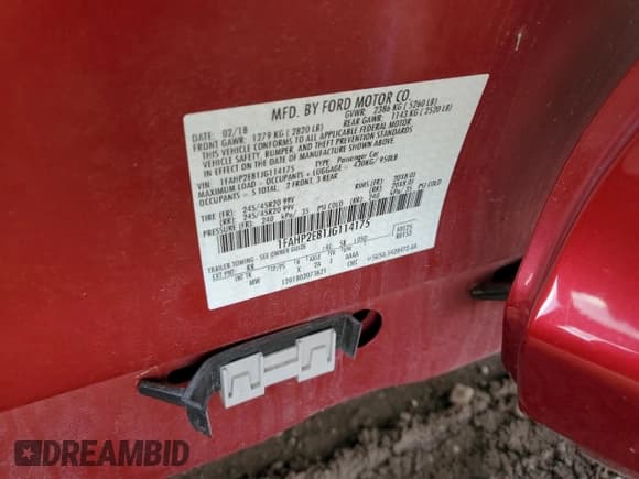 ✅ 2018 Ford Taurus SEL • VIN: 1FAHP2E81JG114175 • Lot: 81822135. Listed on Copart with 33,737 mi. Free auction sales archive from the USA and detailed vehicle history report at DreamBid. Image 12.