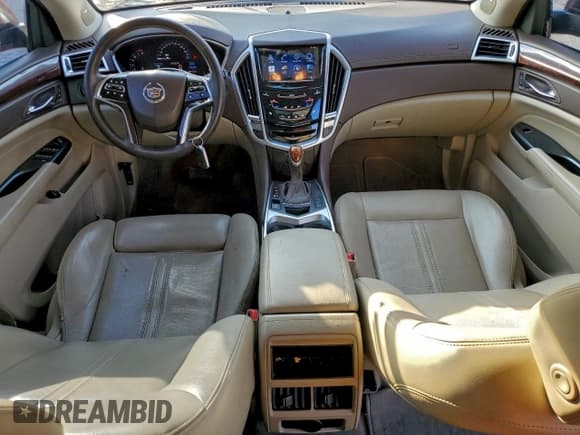 ✅ 2015 Cadillac SRX Performance Collection • VIN: 3GYFNCE31FS583660 • Lot: 94100135. Listed on Copart with 124,220 mi. Free auction sales archive from the USA and detailed vehicle history report at DreamBid. Image 8.