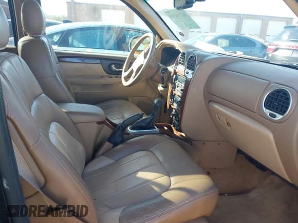 ✅ 2002 GMC Envoy SLT • VIN: 1GKDS13SX22440026 • Lot: 41716249. Wystawiony na IAAI z przebiegiem 179 141 mil. Bezpłatny archiwum sprzedaży aukcyjnych z USA i szczegółowy raport historii pojazdu na DreamBid. Zdjęcie 5.