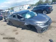 ✅ 2018 Honda Civic Si • VIN: 2HGFC1E5XJH706001 • Lot: 43403054. Listed on IAAI with 147,602 mi. Free auction sales archive from the USA and detailed vehicle history report at DreamBid. Image 1.