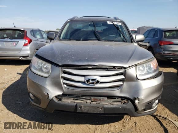 2012 Hyundai Santa Fe Limited with VIN 5XYZKDAG5CG110772, listed as a Copart auction lot 71411764 with 218,606 mi miles and Salvage title. Bid and sale history available at DreamBid. Image 5.