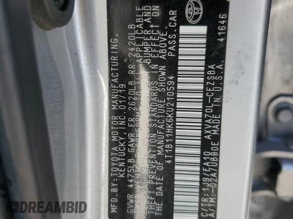 2019 Toyota Camry LE z VIN 4T1B11HK6KU210594, wystawiony jako Copart lot #66894775 z przebiegiem Nie podano mil oraz Szkoda całkowita • Salvage title. Historia ofert i sprzedaży dostępna na DreamBid. Obrazek 12.