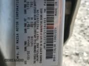 ✅ 2002 Mazda Protege DX • VIN: JM1BJ225721584923 • Лот: 82630595. Опубликован ранее на Copart с пробегом 179 288 миль. Бесплатный доступ к архиву аукционных продаж из США и подробный отчёт об истории автомобиля на DreamBid. Изображение 13.