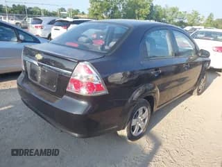 ✅ 2010 Chevrolet Aveo 1LT • VIN: KL1TD5DE3AB106265 • Лот: 42963899. Опубликован ранее на IAAI с пробегом 99 454 миль. Бесплатный доступ к архиву аукционных продаж из США и подробный отчёт об истории автомобиля на DreamBid. Изображение 4.