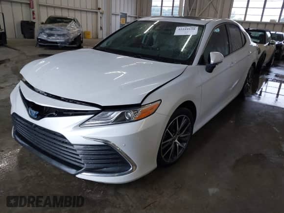 2022 Toyota Camry Hybrid XLE with VIN 4T1F31AK4NU572580, listed as a IAAI auction lot 42244158 with 69,247 mi miles and . Bid and sale history available at DreamBid. Image 18.