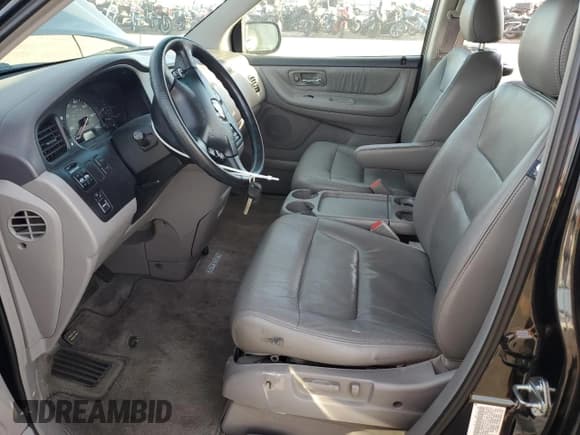 ✅ 2004 Honda Odyssey EX-L • VIN: 5FNRL18704B005034 • Lot: 85877315. Listed on Copart with 128,306 mi. Free auction sales archive from the USA and detailed vehicle history report at DreamBid. Image 7.