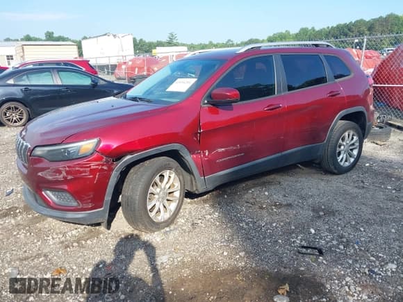 ✅ 2020 Jeep Cherokee Latitude • VIN: 1C4PJLCB5LD581065 • Lot: 42694201. Listed on IAAI with 79,000 mi. Free auction sales archive from the USA and detailed vehicle history report at DreamBid. Image 2.