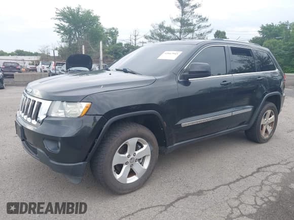 ✅ 2013 Jeep Grand Cherokee Laredo • VIN: 1C4RJFAG7DC502043 • Lot: 42667945. Listed on IAAI with 149,543 mi. Free auction sales archive from the USA and detailed vehicle history report at DreamBid. Image 2.