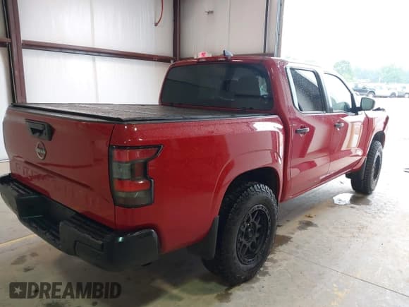 ✅ 2022 Nissan Frontier SV • VIN: 1N6ED1EJ0NN636328 • Lot: 42378786. Listed on IAAI with 56,756 mi. Free auction sales archive from the USA and detailed vehicle history report at DreamBid. Image 4.
