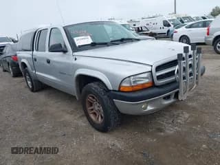✅ 2002 Dodge Dakota Sport • VIN: 1B7HL38X92S719266 • Lot: 43249836. Wystawiony na IAAI z przebiegiem 150 129 mil. Bezpłatny archiwum sprzedaży aukcyjnych z USA i szczegółowy raport historii pojazdu na DreamBid. Zdjęcie 1.