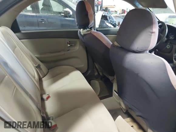 ✅ 2009 Kia Spectra EX • VIN: KNAFE221795662135 • Lot: 43847748. Listed on IAAI with 99,869 mi. Free auction sales archive from the USA and detailed vehicle history report at DreamBid. Image 8.