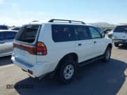 ✅ 2003 Mitsubishi Montero Sport ES • VIN: JA4LS21HX3J018795 • Lot: 42889410. Wystawiony na IAAI z przebiegiem 161 383 mil. Bezpłatny archiwum sprzedaży aukcyjnych z USA i szczegółowy raport historii pojazdu na DreamBid. Zdjęcie 4.