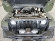 ✅ 2021 Jeep Gladiator Willys • VIN: 1C6HJTAG1ML613351 • Lot: 70010625. Listed on Copart with 52,049 mi. Free auction sales archive from the USA and detailed vehicle history report at DreamBid. Image 12.