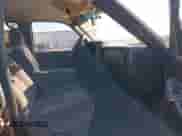 2006 GMC Sierra 1500 SL with VIN 2GTEC13V561241074, listed as a IAAI auction lot 43550364 with 206,725 mi miles and . Bid and sale history available at DreamBid. Image 5.