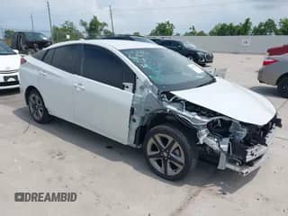 2021 Toyota Prius L Eco with VIN JTDKAMFU9M3136865, listed as a IAAI auction lot 42476212 with 16,961 mi miles and . Bid and sale history available at DreamBid. Image 1.