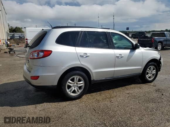 ✅ 2012 Hyundai Santa Fe GLS • VIN: 5XYZGDAB0CG156872 • Лот: 72463214. Размещён на Copart с пробегом 124 528 миль миль. Получите бесплатный доступ к архиву аукционных продаж из США и посмотрите подробный отчёт об истории автомобиля на DreamBid. Изображение 3.
