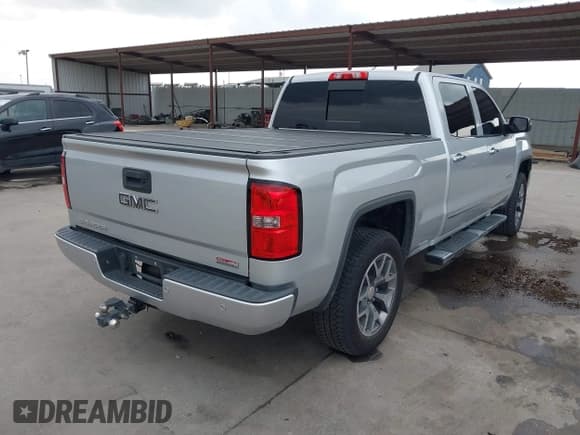 ✅ 2014 GMC Sierra 1500 SLT • VIN: 3GTU2VEC7EG103186 • Lot: 43715336. Listed on IAAI with 218,583 mi. Free auction sales archive from the USA and detailed vehicle history report at DreamBid. Image 4.