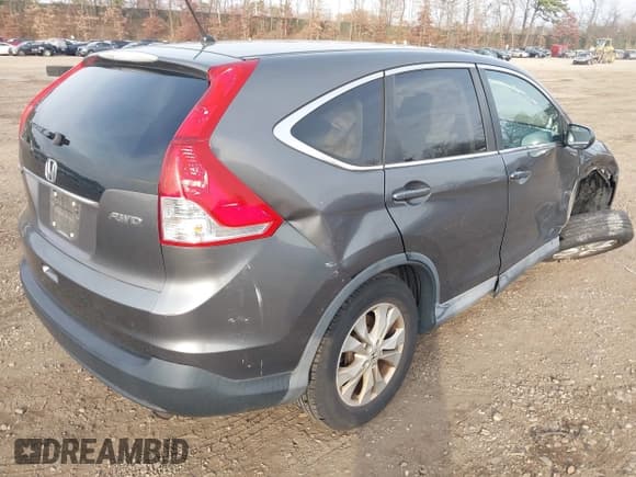✅ 2014 Honda CR-V EX • VIN: 2HKRM4H54EH690333 • Lot: 43637097. Listed on IAAI with 102,028 mi. Free auction sales archive from the USA and detailed vehicle history report at DreamBid. Image 4.