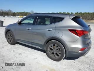 ✅ 2017 Hyundai Santa Fe Ultimate • VIN: 5XYZW4LA3HG462902 • Лот: 42781354. Опубликован ранее на Copart с пробегом 121 168 миль. Бесплатный доступ к архиву аукционных продаж из США и подробный отчёт об истории автомобиля на DreamBid. Изображение 2.