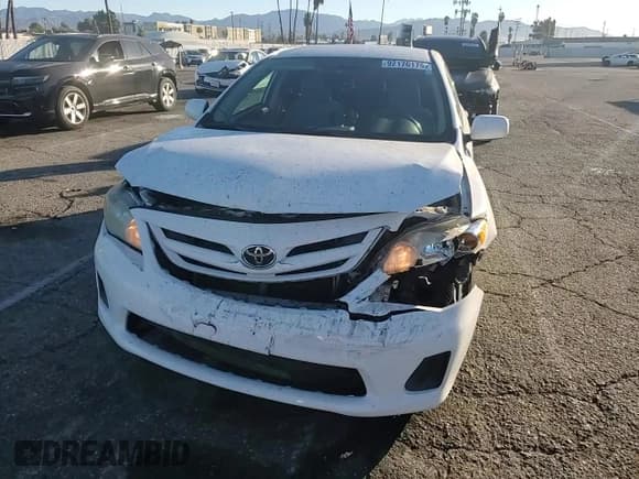 ✅ 2013 Toyota Corolla L • VIN: 5YFBU4EE0DP205354 • Lot: 92176175. Listed on Copart with 131,743 mi. Free auction sales archive from the USA and detailed vehicle history report at DreamBid. Image 13.