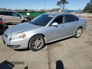 2009 Chevrolet Impala LTZ with VIN 2G1WU57M291289879, listed as a Copart auction lot 82358105 with 131,901 mi miles and Salvage title. Bid and sale history available at DreamBid. Image 1.