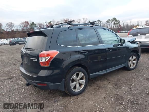 ✅ 2015 Subaru Forester Limited • VIN: JF2SJAHCXFH410987 • Lot: 43668080. Listed on IAAI with 161,820 mi. Free auction sales archive from the USA and detailed vehicle history report at DreamBid. Image 4.