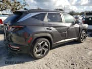 ✅ 2023 Hyundai Tucson SEL • VIN: 5NMJF3AE0PH241100 • Lot: 76880754. Wystawiony na Copart z przebiegiem 6 996 mil. Bezpłatny archiwum sprzedaży aukcyjnych z USA i szczegółowy raport historii pojazdu na DreamBid. Zdjęcie 3.