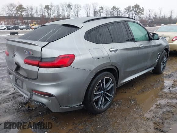 ✅ 2021 BMW X4 M • VIN: 5YMUJ0C01M9F26207 • Lot: 41502307. Listed on IAAI with 31,995 mi. Free auction sales archive from the USA and detailed vehicle history report at DreamBid. Image 4.