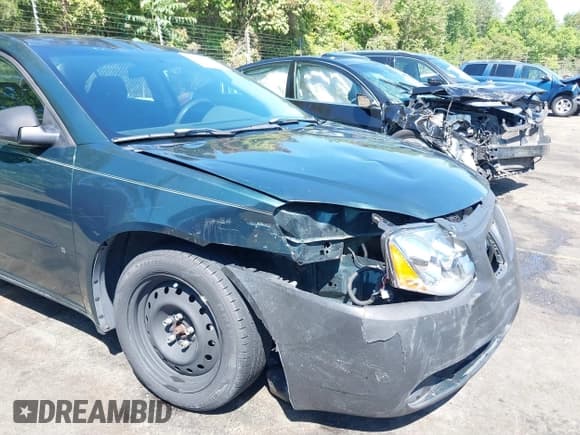 ✅ 2006 Pontiac G6 6-Cyl • VIN: 1G2ZG558764223494 • Lot: 39307111. Wystawiony na IAAI z przebiegiem 214 526 mil. Bezpłatny archiwum sprzedaży aukcyjnych z USA i szczegółowy raport historii pojazdu na DreamBid. Zdjęcie 6.