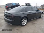 ✅ 2015 Audi A6 • VIN: WAUFMBFCXFN038808 • Lot: 41534694. Listed on IAAI with 141,986 mi. Free auction sales archive from the USA and detailed vehicle history report at DreamBid. Image 4.