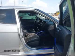 2015 Hyundai Veloster Turbo R-Spec with VIN KMHTC6AE0FU225114, listed as a IAAI auction lot 43236842 with 144,138 mi miles and . Bid and sale history available at DreamBid. Image 5.