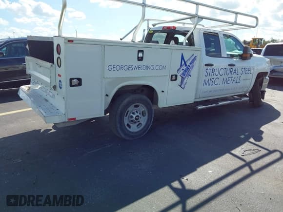 ✅ 2015 Chevrolet Silverado 2500HD Work Truck • VIN: 1GB2CUEGXFZ511799 • Лот: 43329692. Опубликован ранее на IAAI с пробегом 74 004 миль. Бесплатный доступ к архиву аукционных продаж из США и подробный отчёт об истории автомобиля на DreamBid. Изображение 4.