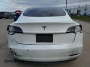 ✅ 2022 Tesla Model 3 • VIN: 5YJ3E1EA5NF201715 • Lot: 50732595. Listed on Copart with 116,913 mi. Free auction sales archive from the USA and detailed vehicle history report at DreamBid. Image 6.