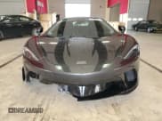 ✅ 2023 McLaren GT • VIN: SBM22GCAXPW002692 • Lot: 41496504. Wystawiony na Copart z przebiegiem Nie podano. Bezpłatny archiwum sprzedaży aukcyjnych z USA i szczegółowy raport historii pojazdu na DreamBid. Zdjęcie 5.