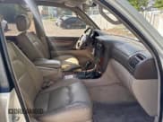 ✅ 1999 Lexus LX 470 • VIN: JT6HT00W2X0043142 • Lot: 80572235. Wystawiony na Copart z przebiegiem 255 958 mil. Bezpłatny archiwum sprzedaży aukcyjnych z USA i szczegółowy raport historii pojazdu na DreamBid. Zdjęcie 5.