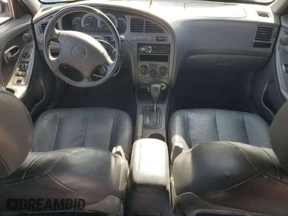 2003 Hyundai Elantra GLS z VIN KMHDN45D33U629413, wystawiony jako Copart lot #78414854 z przebiegiem 195 266 mil mil oraz Szkoda całkowita • Salvage title. Historia ofert i sprzedaży dostępna na DreamBid. Obrazek 8.