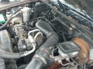 ✅ 1996 Chevrolet Blazer LS • VIN: 1GNCS13W4TK233425 • Lot: 42793679. Wystawiony na IAAI z przebiegiem 202 943 mil. Bezpłatny archiwum sprzedaży aukcyjnych z USA i szczegółowy raport historii pojazdu na DreamBid. Zdjęcie 13.