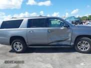✅ 2020 Chevrolet Suburban LT • VIN: 1GNSCHKC4LR302047 • Lot: 42518927. Listed on IAAI with 105,760 mi. Free auction sales archive from the USA and detailed vehicle history report at DreamBid. Image 13.