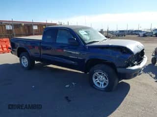 2002 Dodge Dakota Sport z VIN 1B7GG32N42S588254, wystawiony jako IAAI lot #41707333 z przebiegiem 93 317 mil mil oraz . Historia ofert i sprzedaży dostępna na DreamBid. Obrazek 1.