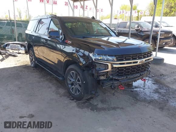 2022 Chevrolet Tahoe Z71 z VIN 1GNSKPKD1NR242429, wystawiony jako IAAI lot #42058520 z przebiegiem 63 699 mil mil oraz . Historia ofert i sprzedaży dostępna na DreamBid. Obrazek 1.