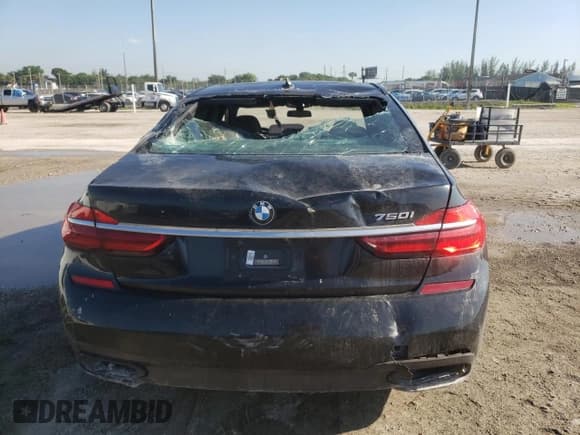 ✅ 2018 BMW 7 Series 750i • VIN: WBA7F0C58JGM23726 • Лот: 69116685. Опубликован ранее на Copart с пробегом 32 765 миль. Бесплатный доступ к архиву аукционных продаж из США и подробный отчёт об истории автомобиля на DreamBid. Изображение 6.