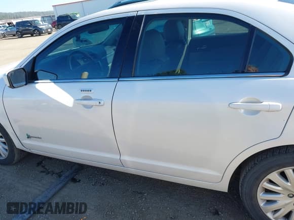 ✅ 2012 Ford Fusion Hybrid • VIN: 3FADP0L36CR414428 • Lot: 43462972. Listed on IAAI with 198,121 mi. Free auction sales archive from the USA and detailed vehicle history report at DreamBid. Image 14.